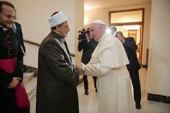 Image may contain: 1 person, smiling, standing